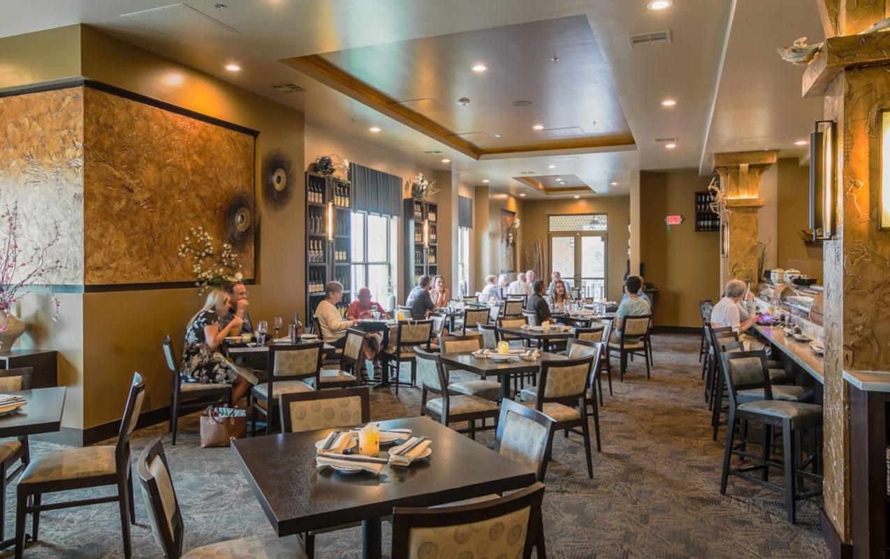Interior, guests enjoying food and drinks